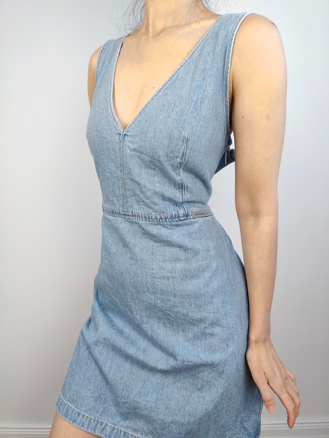 The Calvin Klein Light Blue Denim Mini Dress | Preloved Second Hand CK Jeans spring summer short sleeveless M