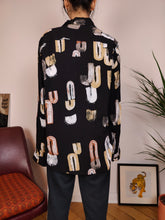Load image into Gallery viewer, Vintage blouse viscose black art crazy print geometrical pattern shirt women M-L
