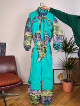 Load image into Gallery viewer, Vintage 90s ski suit snow snowboard winter sport onesie overall jumpsuit blue turquoise pattern 176 S
