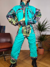 Load image into Gallery viewer, Vintage 90s ski suit snow snowboard winter sport onesie overall jumpsuit blue turquoise pattern 176 S
