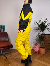 Load image into Gallery viewer, Vintage 90s EKIP ski suit snow snowboard winter sport onesie overall jumpsuit black yellow 44 S
