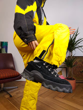 Load image into Gallery viewer, Vintage 90s EKIP ski suit snow snowboard winter sport onesie overall jumpsuit black yellow 44 S
