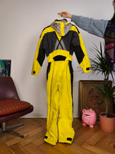 Lade das Bild in den Galerie-Viewer, Vintage Colmar designer ski suit snow snowboard winter sport onesie overall jumpsuit black yellow IT44 DE38 US8 EU S
