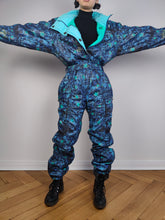 Load image into Gallery viewer, The Blue Star Ski Suit | Vintage 90s retro snow snowboard winter sport onesie overall jumpsuit woman camouflage pattern Kananaski Country Finland EU36 IT42 F38 UK10 US8 S
