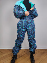 Load image into Gallery viewer, The Blue Star Ski Suit | Vintage 90s retro snow snowboard winter sport onesie overall jumpsuit woman camouflage pattern Kananaski Country Finland EU36 IT42 F38 UK10 US8 S
