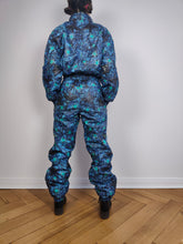 Load image into Gallery viewer, The Blue Star Ski Suit | Vintage 90s retro snow snowboard winter sport onesie overall jumpsuit woman camouflage pattern Kananaski Country Finland EU36 IT42 F38 UK10 US8 S
