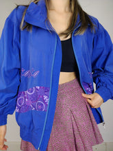 Load image into Gallery viewer, The Blue Lotto | Vintage 90s Lotto blue purple embroidery sport track shell jacket pattern M
